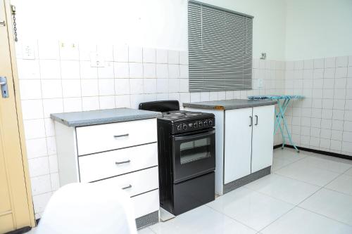 Η κουζίνα ή μικρή κουζίνα στο Delux Guesthouse