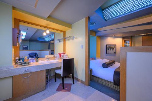 Katil atau katil-katil dalam bilik di Water Hotel Mw (Love Hotel)