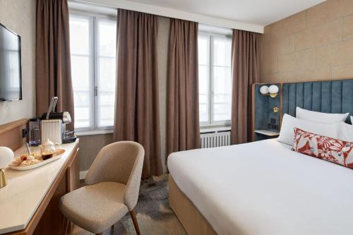 Postel nebo postele na pokoji v ubytování Best Western Saint-Louis - Grand Paris - Vincennes