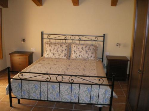 En eller flere senge i et værelse på Villa RosaMaria