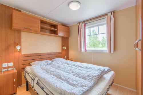 Cama o camas de una habitación en KustCamp Gamleby