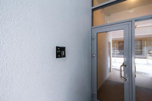 an open door of an office with at Cozy Center Druskininkai in Druskininkai