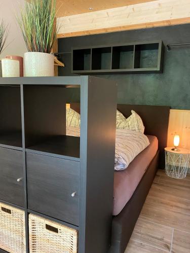 Una cama o camas en una habitación de Hotel Sonnenlicht Maria Alm