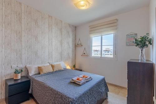 Postel nebo postele na pokoji v ubytování 797 HOLIDAY RENTALS - Precioso apartamento con vistas a Arenal golf