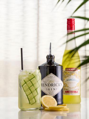 a drink with fruit and a bottle of alcohol at The Chester Hotel in Aberdeen