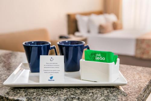 Кровать или кровати в номере Plaza Inn American Loft - Barra Funda