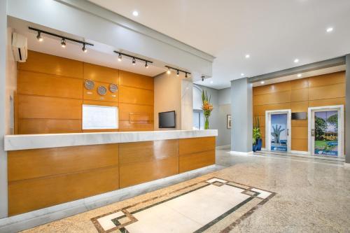 Телевизор и/или развлекательный центр в Plaza Inn American Loft - Barra Funda