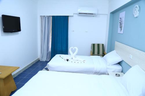 Lamera Hotelにあるベッド