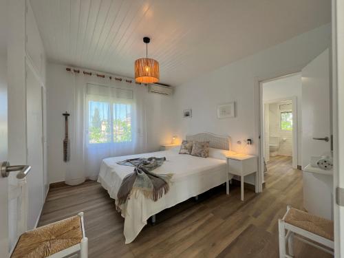 Postel nebo postele na pokoji v ubytování 07301 Casa del Mar