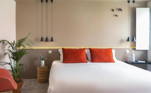 Letto o letti in una camera di Mercure Porto Centro Santa Catarina