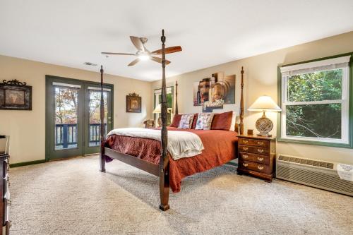a bedroom with a bed and a ceiling fan at Mt Yonah Studio B in Helen