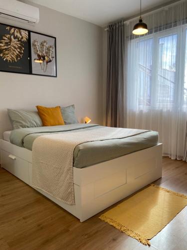 Postel nebo postele na pokoji v ubytování Hostal Orange Vibes