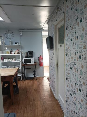 Televisyen dan/atau pusat hiburan di Alojamiento Emilia House