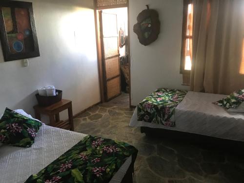 Postel nebo postele na pokoji v ubytování Hotel del Campo