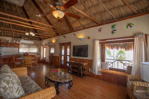 a living room with a couch and a table at Captain Morgan's Retreat in San Pedro