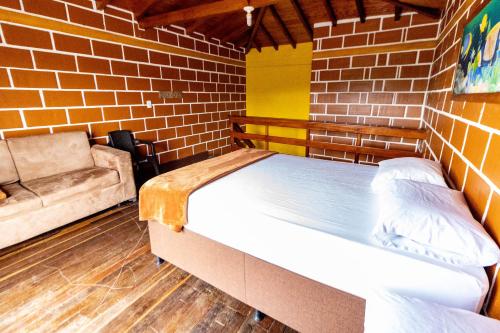 Finca-Hotel Montecarlo Guatape by Hopeにあるベッド