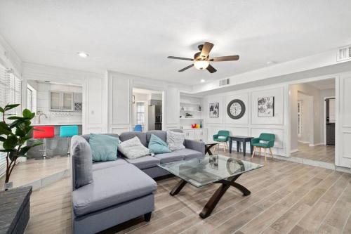 a living room with a couch and a table at Pool & hot SPA & 5 bedroom 3 full bath in McKinney