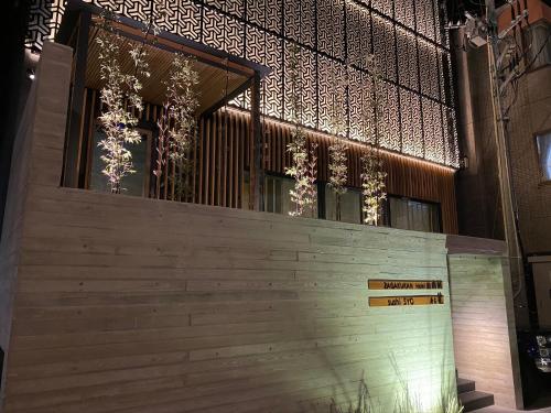a facade of a building with lights on it at Hotel Zagakukan in Hakone