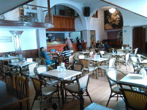 A restaurant or other place to eat at Royal Mindelo Suite