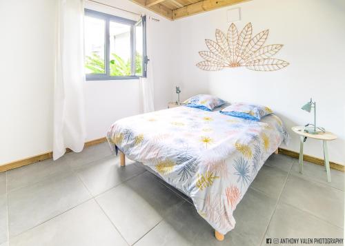 Postel nebo postele na pokoji v ubytování Villa Fleur de Jade
