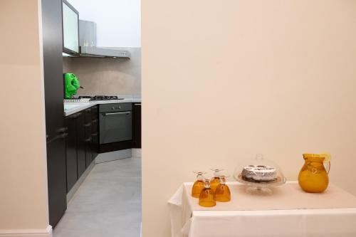 Η κουζίνα ή μικρή κουζίνα στο Bernini House Naples