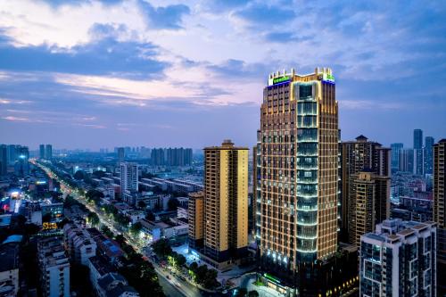 a view of a city with a tall building at Holiday Inn Express Nanning Jiangnan by IHG in Nanning