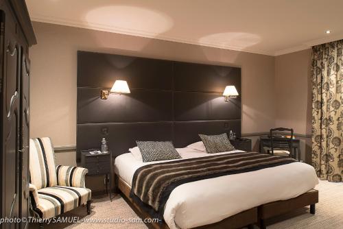Кровать или кровати в номере Le Grand Hotel & Spa