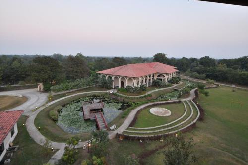 an aerial view of a garden with a pavilion at Bhanu The Fern Forest Resort & Spa, Jambughoda in Jambughoda