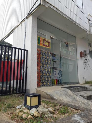 a store front with a box in front of it at Siril Guesthouse Hostel in Nuwara Eliya
