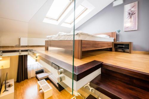 Kuchyňa alebo kuchynka v ubytovaní Radziwillowska Old Town Deluxe Apartment WAWELOFTS