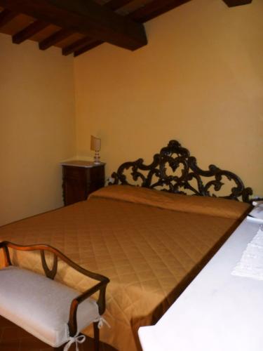 Katil atau katil-katil dalam bilik di Agriturismo Casa Belvedere