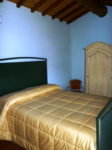 Katil atau katil-katil dalam bilik di Agriturismo Casa Belvedere