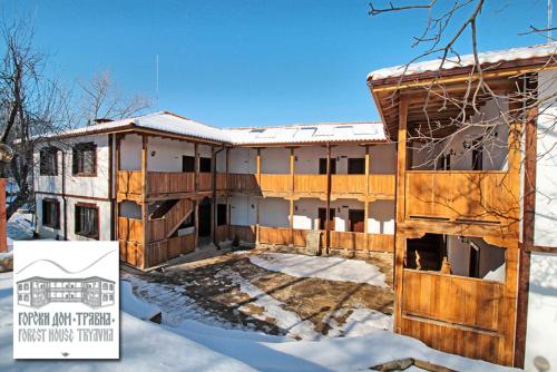 a house under construction in the snow at Арт комплекс Горски дом - Трявна in Tryavna