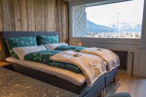Wolfgangsee Appartementsにあるベッド