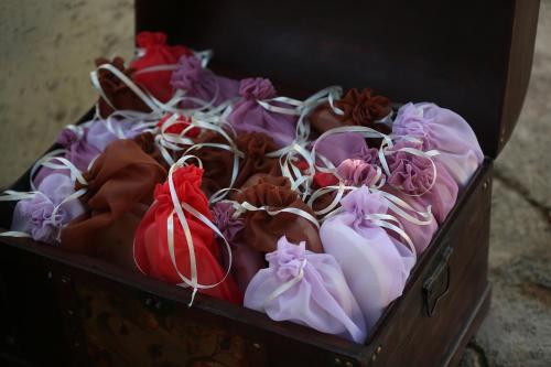 a wooden box filled with different colored roses at Sava Salinas in Las Salinas