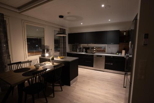Kuchyň nebo kuchyňský kout v ubytování Cozy & Spacious Apartment