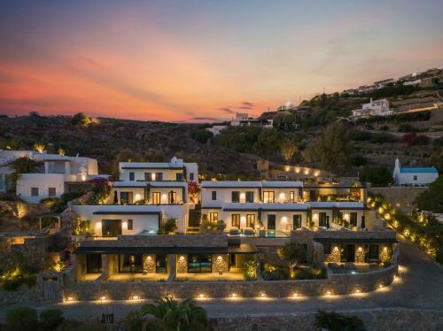 an aerial view of a mansion at night at Noima Boutique Hotel Mykonos in Agios Ioannis Mykonos