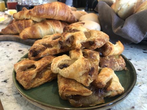 a plate of cookies and croissants on a table at Tempel Wines in Paarl