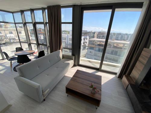 Χώρος καθιστικού στο Alya Rooms