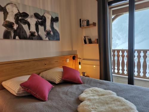 Ένα ή περισσότερα κρεβάτια σε δωμάτιο στο Le Boréal - Chalet des Etoiles