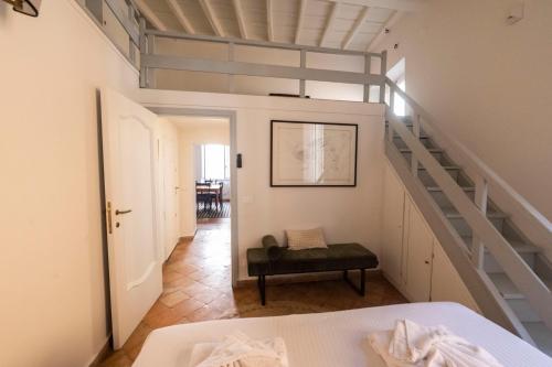 A bed or beds in a room at Artsy and elegant apartment near Pantheon