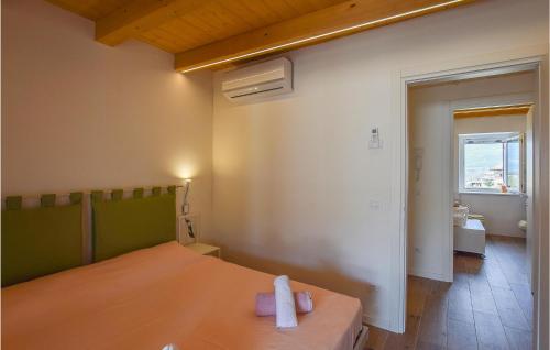 Ένα ή περισσότερα κρεβάτια σε δωμάτιο στο Corte Maccarini
