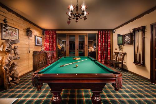 a billiard room with a pool table at Villa Borovets Mountain & Luxury in Borovets