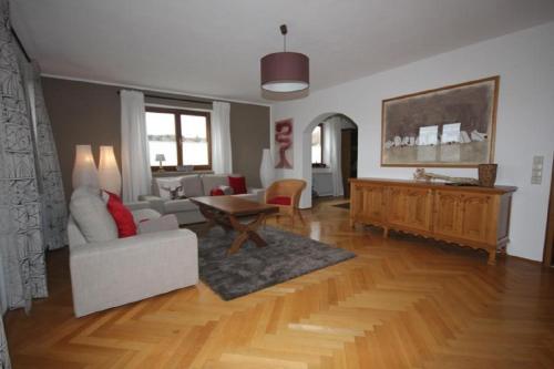 a living room with a couch and a table at Ferienwohnung Bothe in Zandt