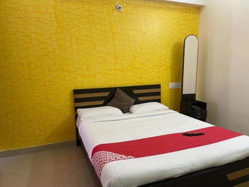 Postel nebo postele na pokoji v ubytování Green Valley Residency