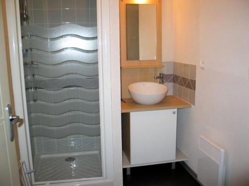 a bathroom with a sink and a shower at Boost Your Immo Bois De Marie Barèges PM9 in Barèges