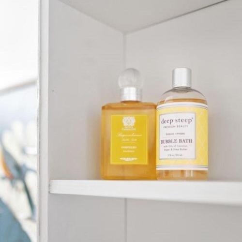two bottles of soap sitting on a shelf at Panorama Place in Reno