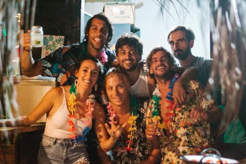 a group of people posing for a picture at Indiana Kite school and Hostel in Cumbuco