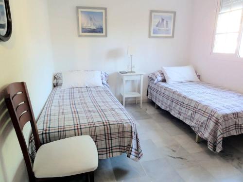 Postel nebo postele na pokoji v ubytování Holiday Apartment Near The Best Beach Of Marbella num01