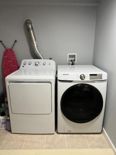 a stove and a microwave in a room at #1 Bright Private Room near New Brunswick, NJ downtown in New Brunswick